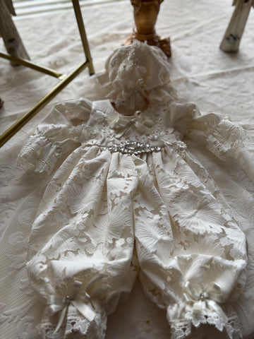 Cream baby jumpsuit and bonnet