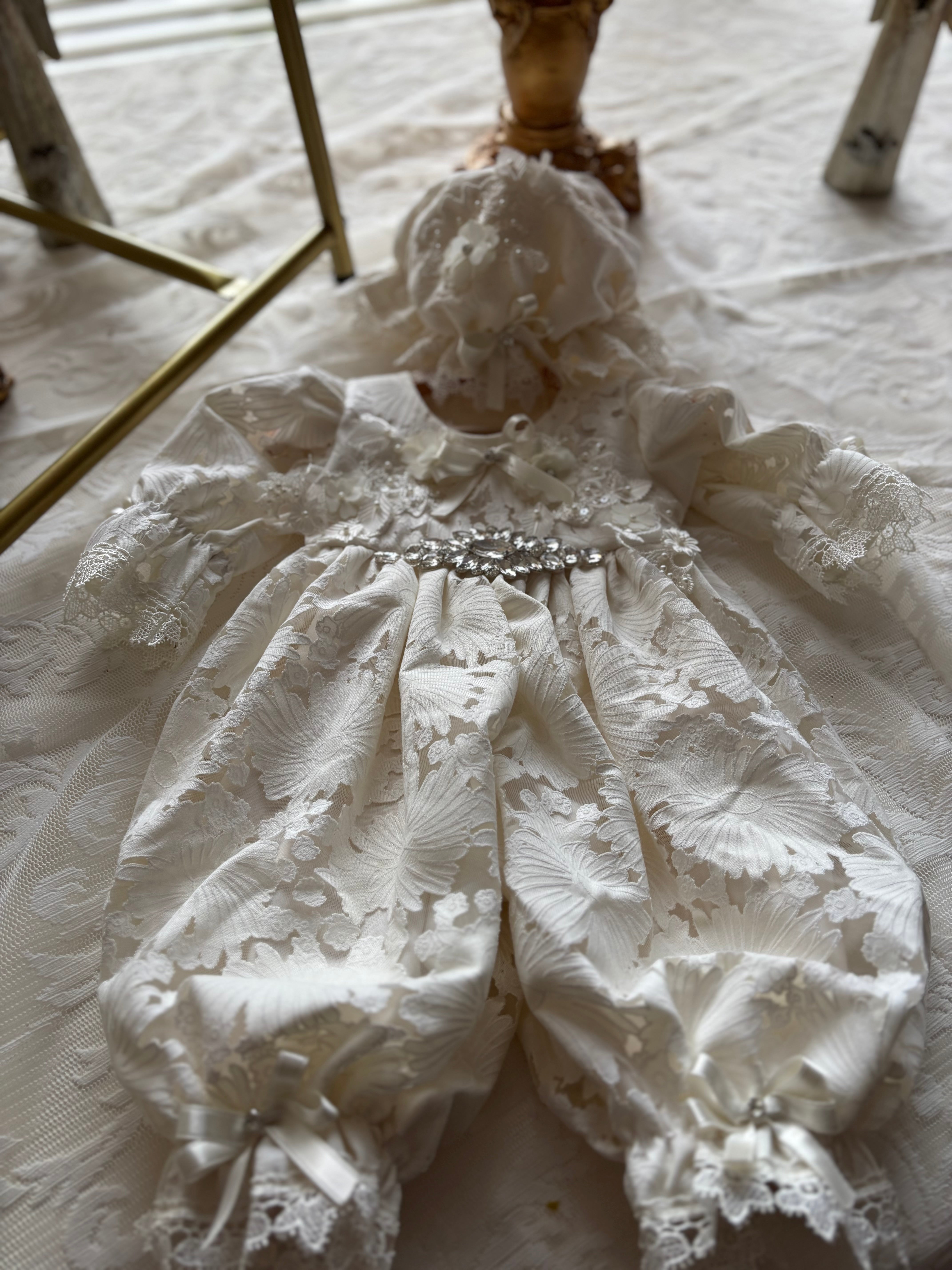 Cream baby jumpsuit and bonnet
