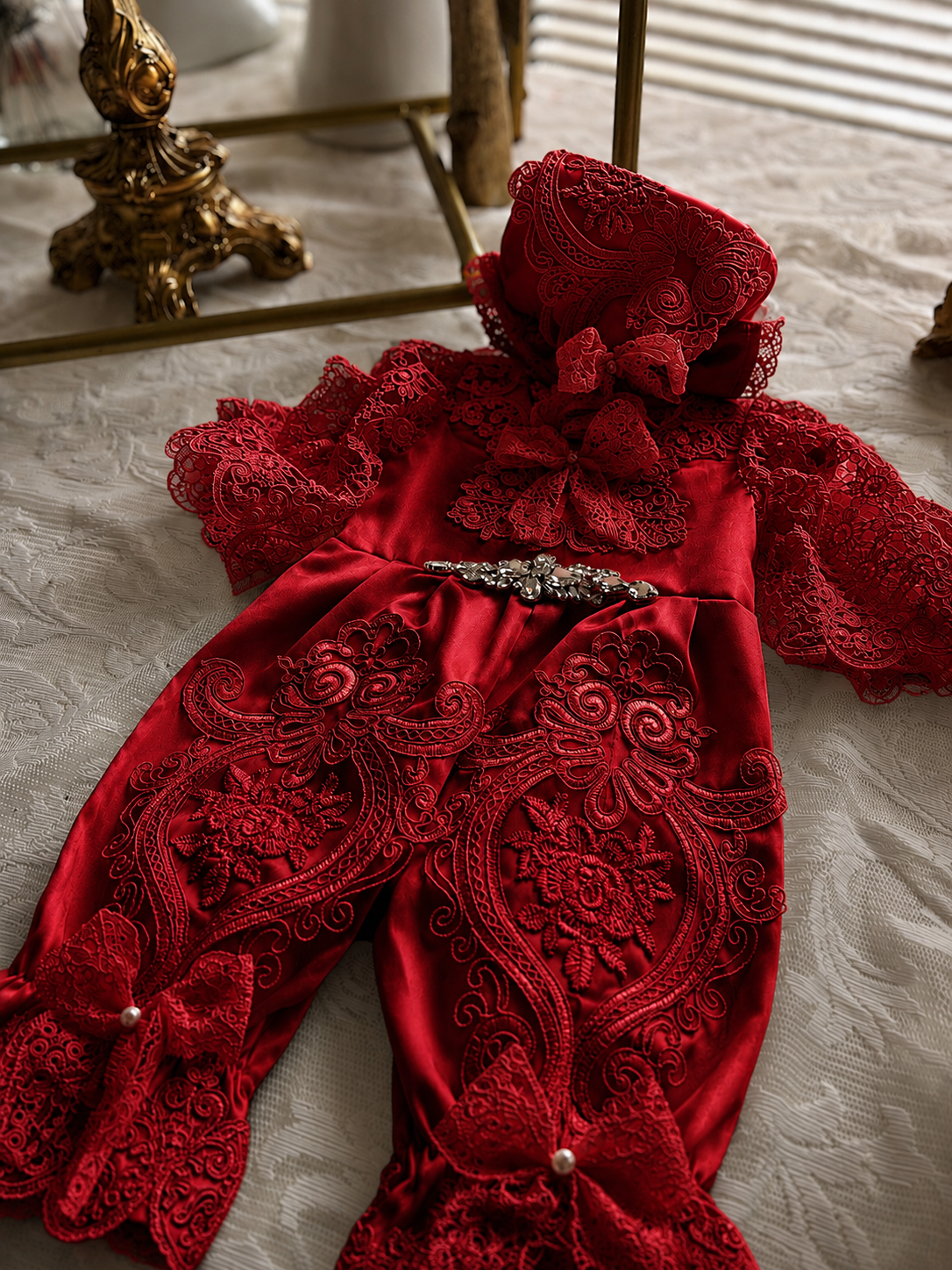 Red holiday baby jumpsuit and bonnet