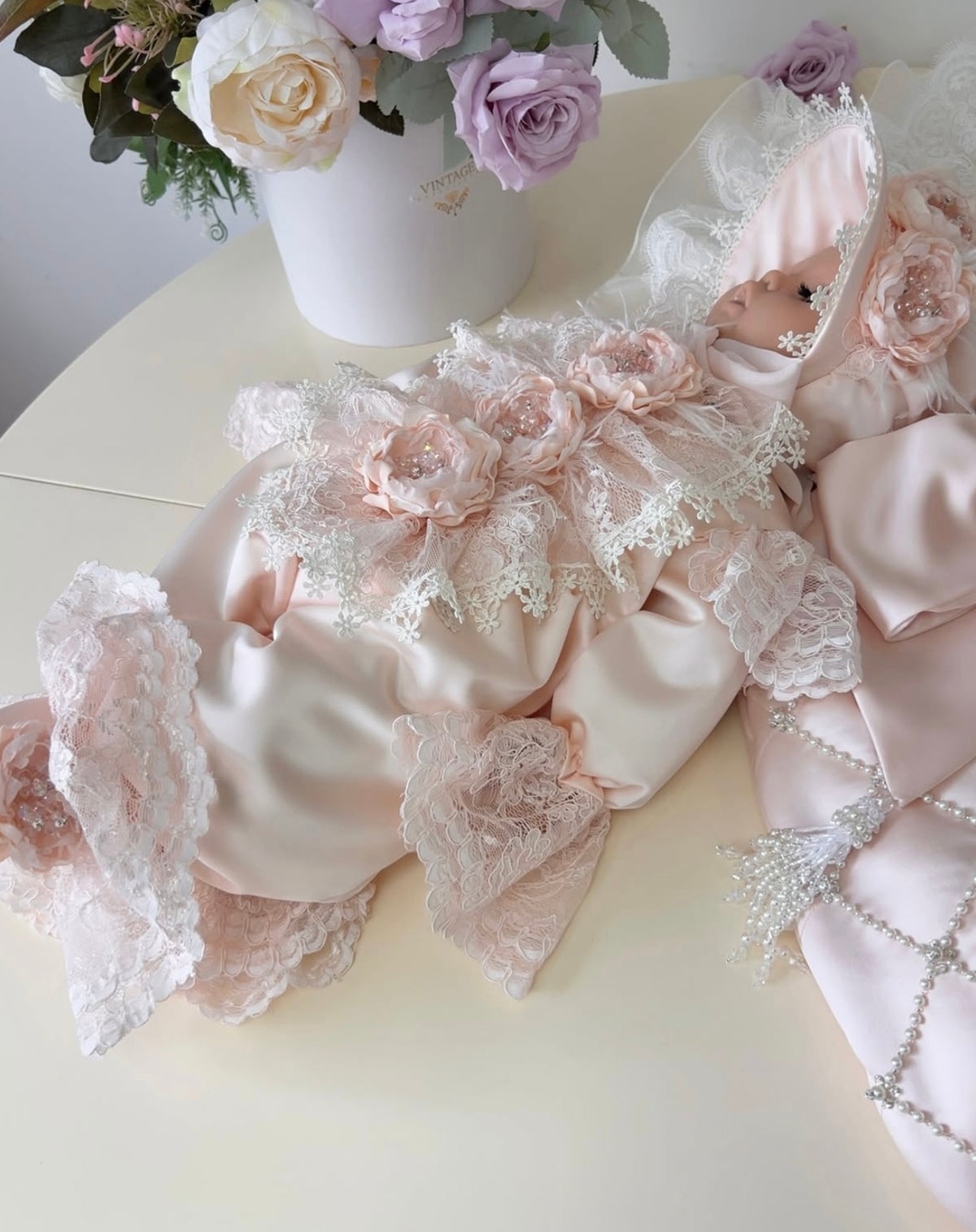 Light pink baby jumpsuit swaddle bonnet and shoes