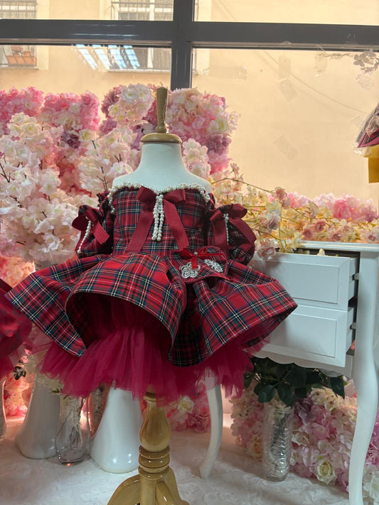 red plain puffy dress and hair bow