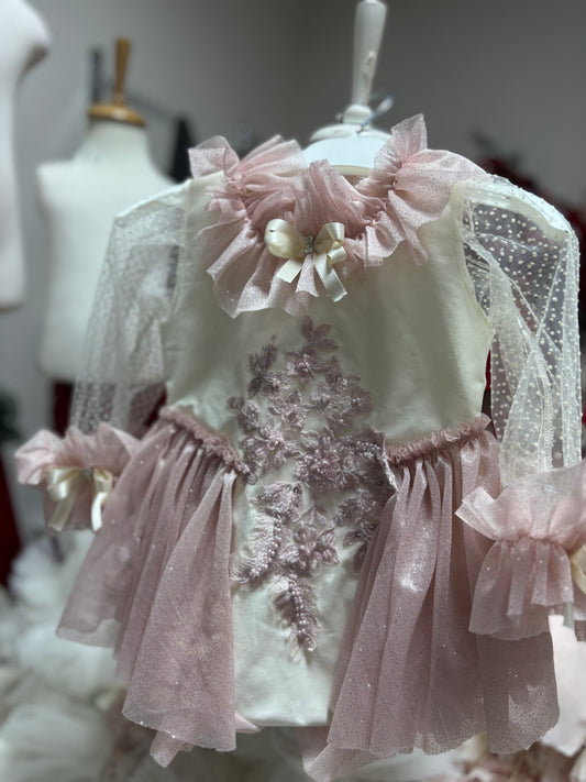 Girl and baby romper