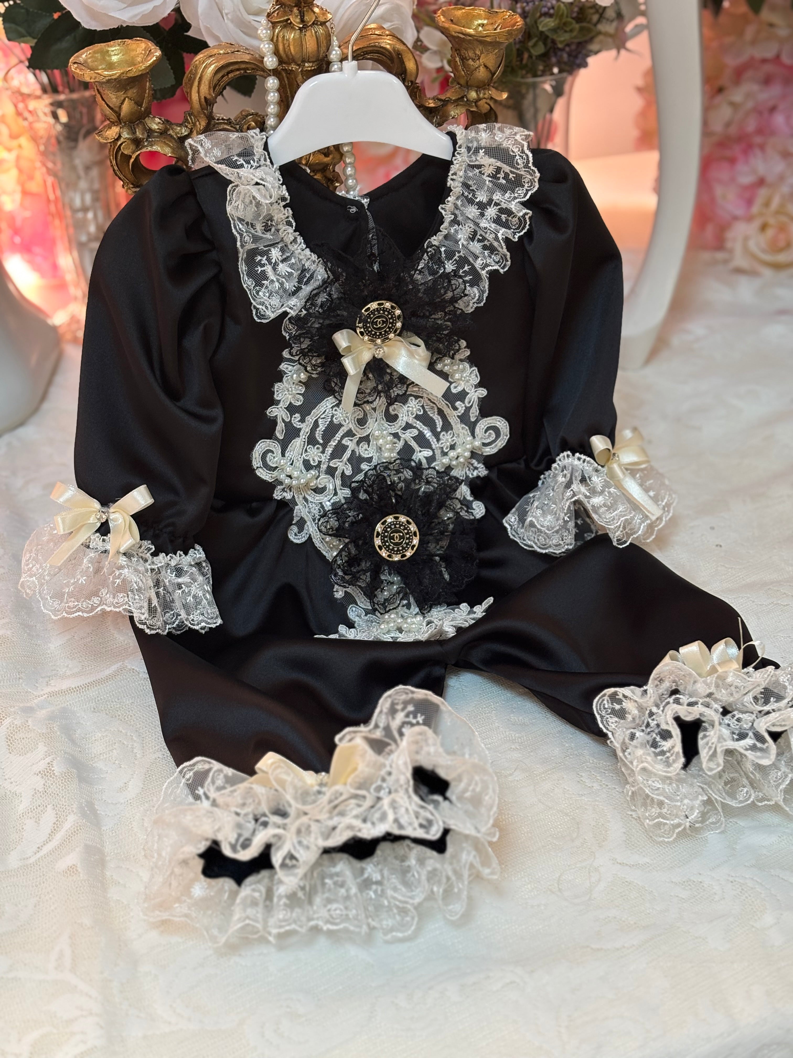 Black baby jumpsuit and bonnet