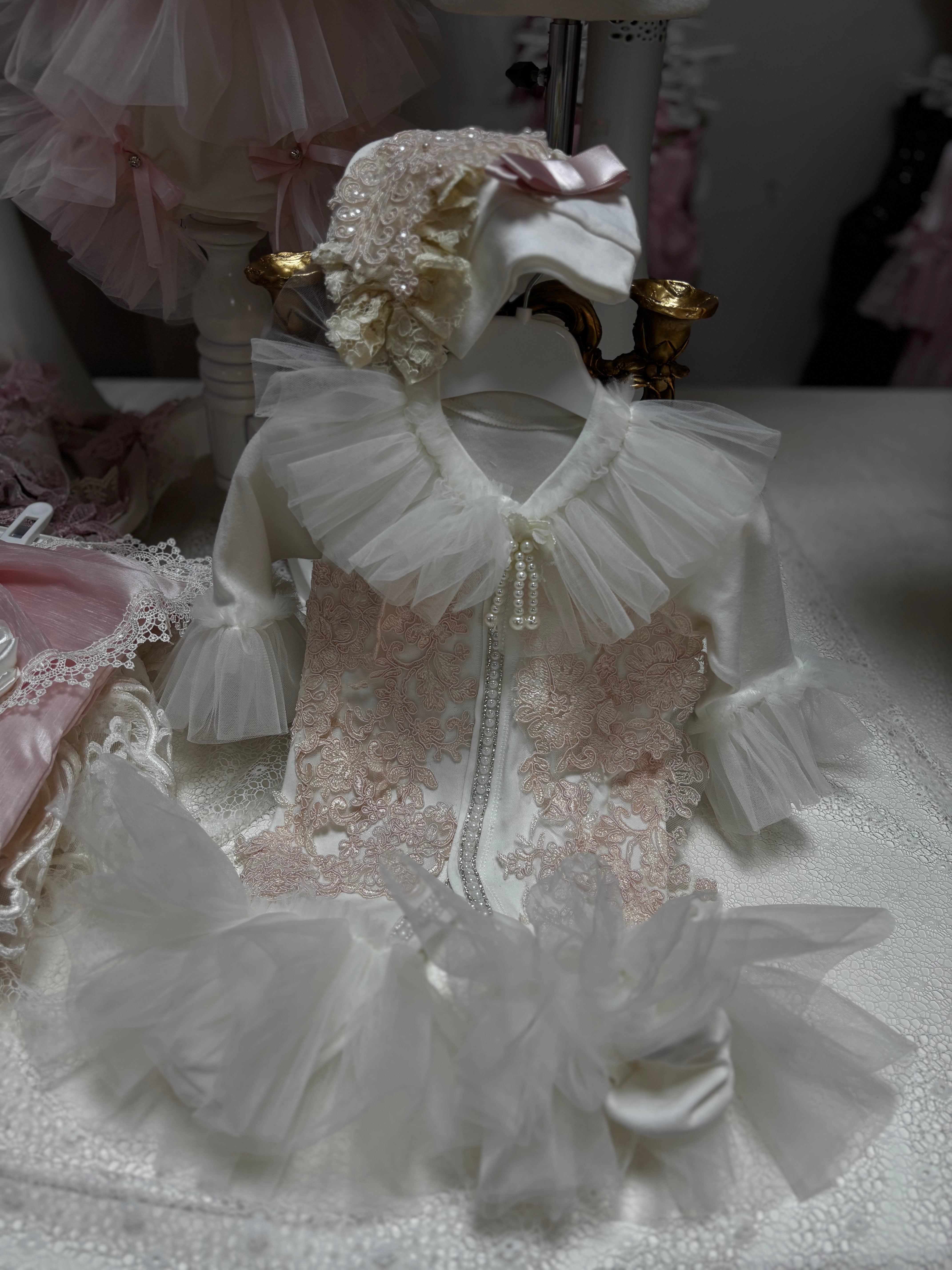 Cream baby jumpsuit and hat