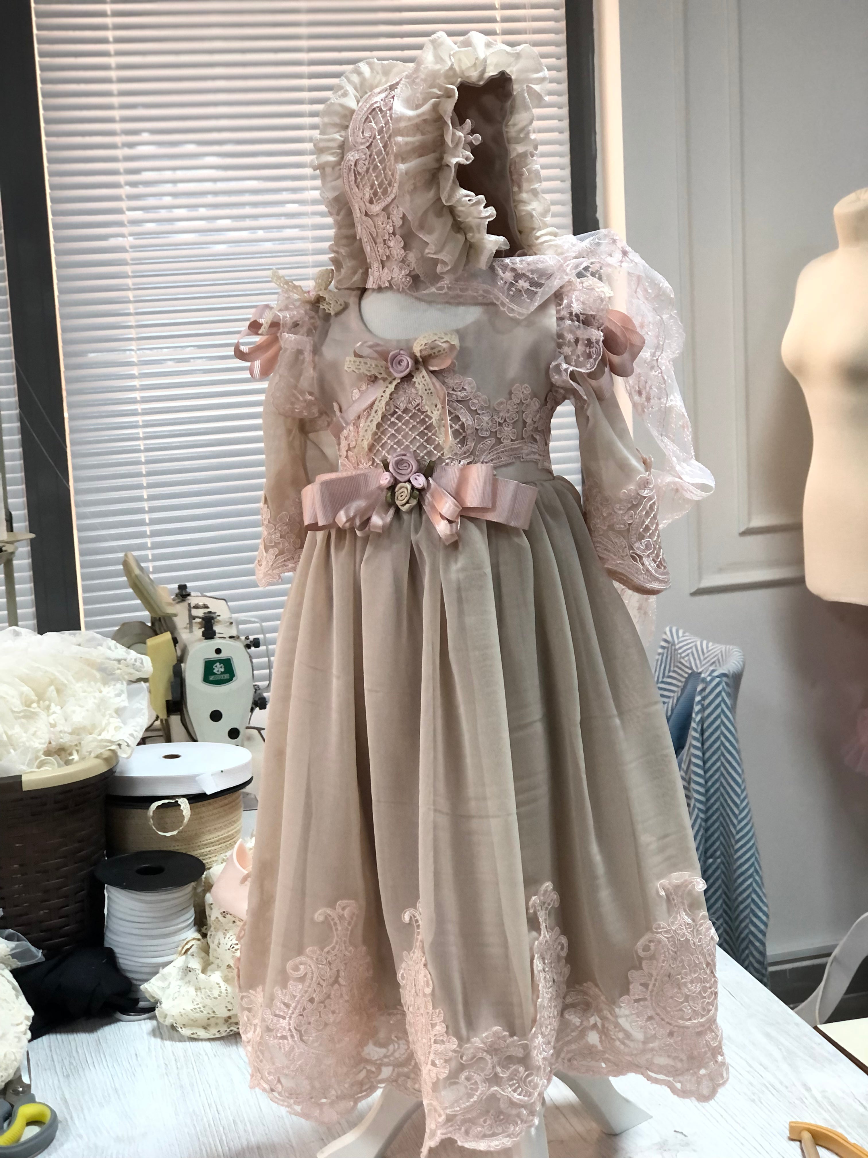 Baby and girl dresses and bonnet