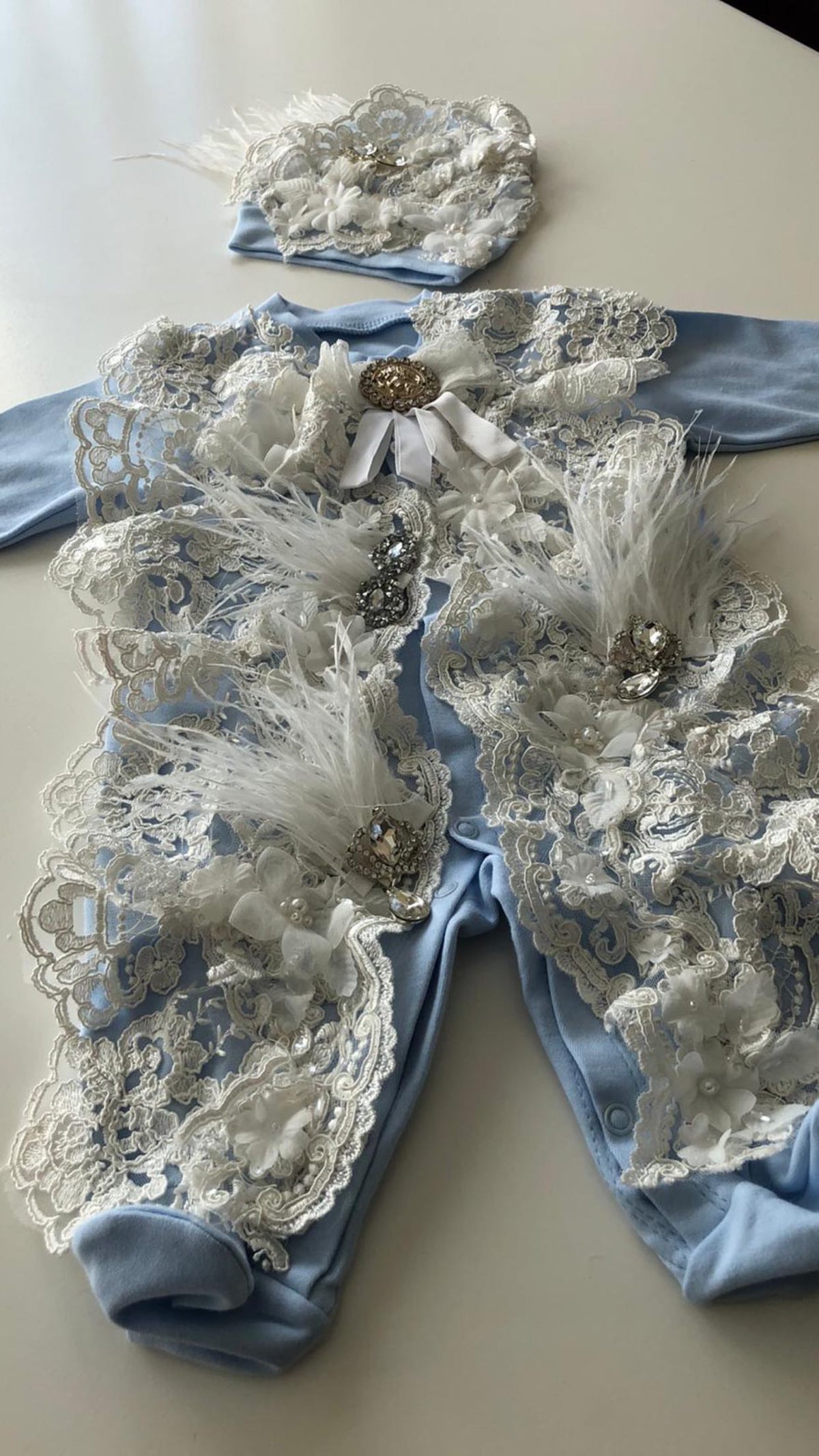 Blue baby romper and bonnet