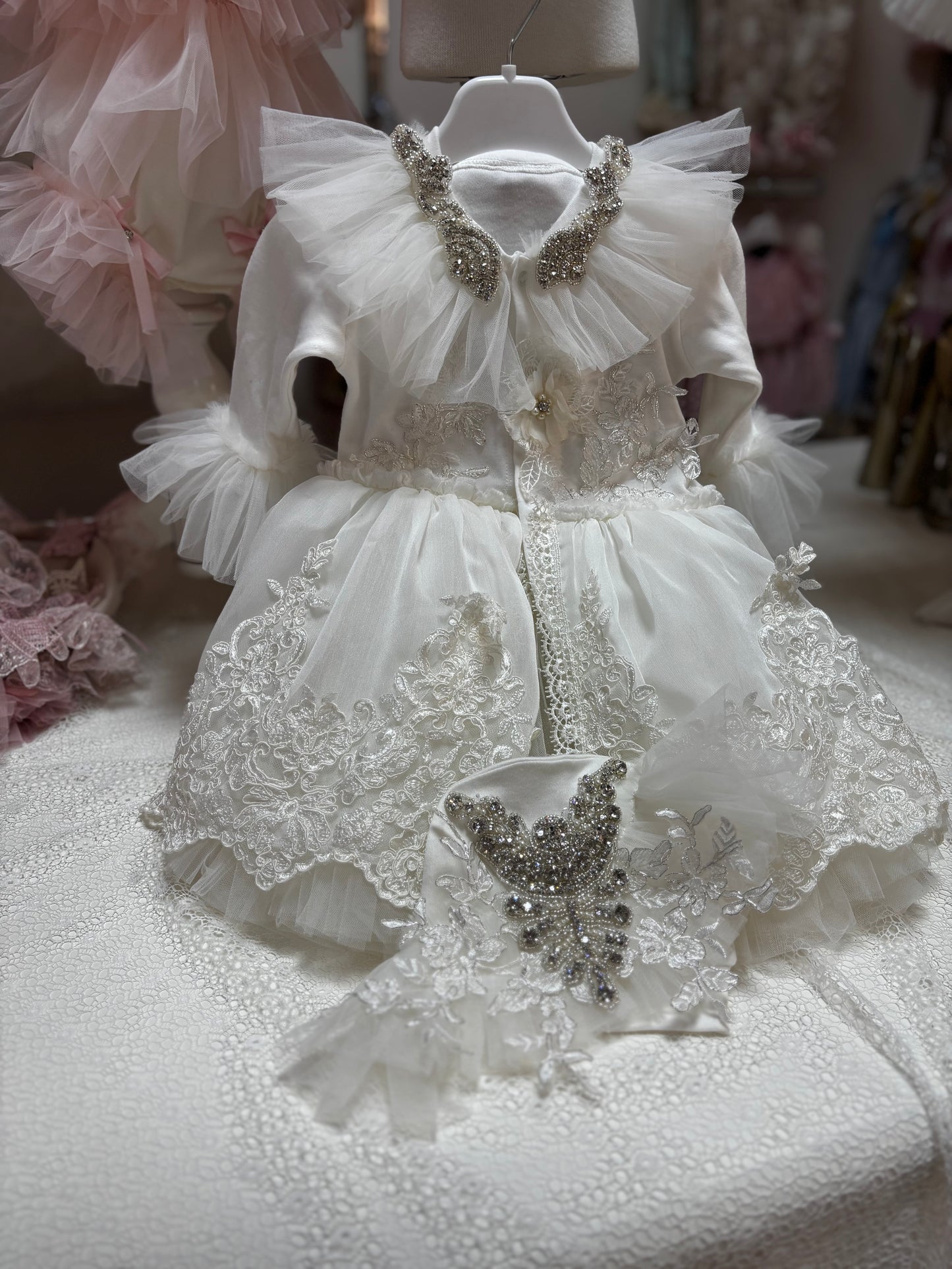 Cream baby jumpsuit and hat