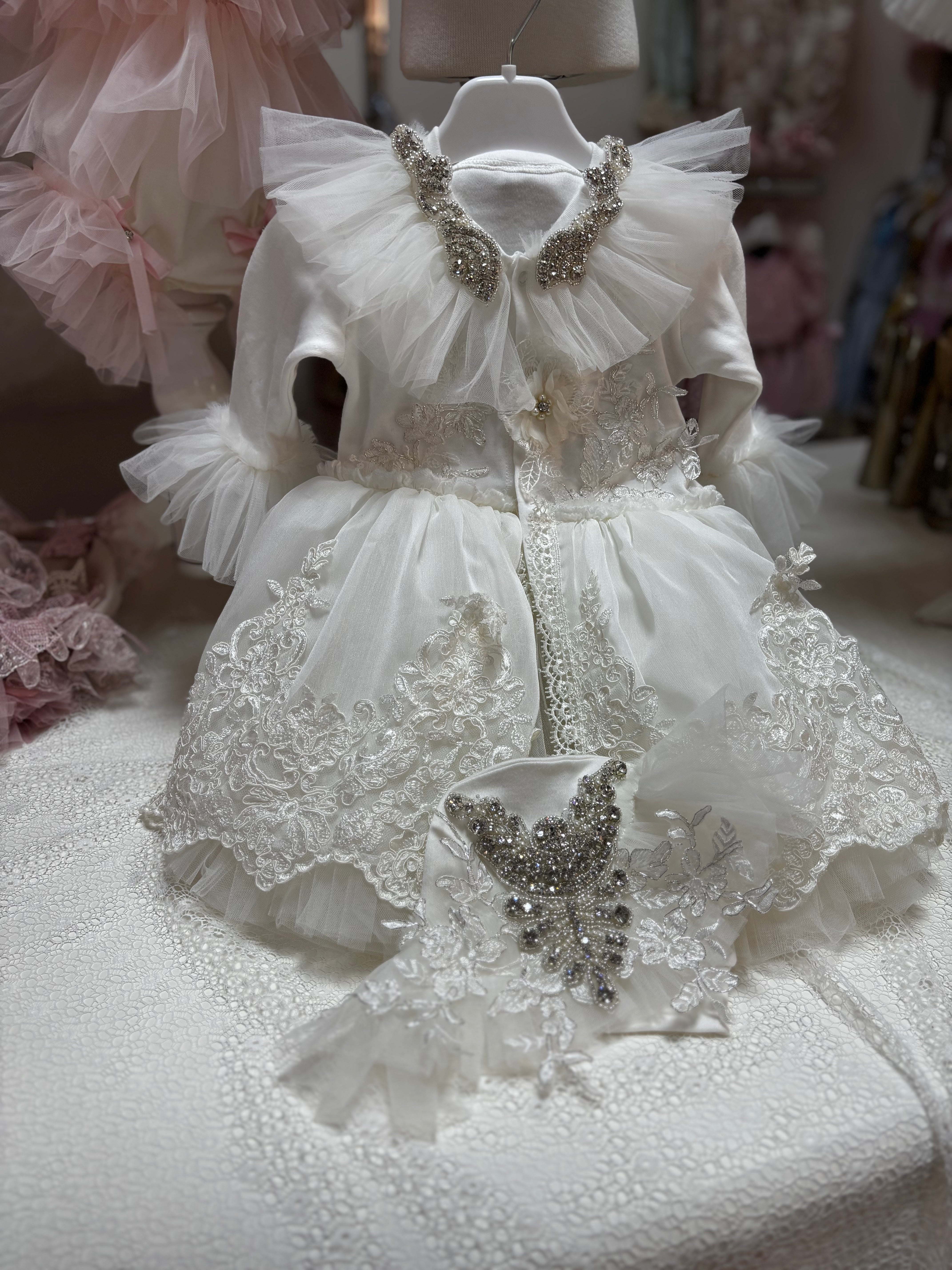 Cream baby jumpsuit and hat