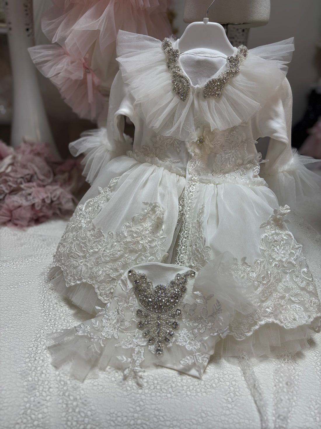 Cream baby jumpsuit and hat