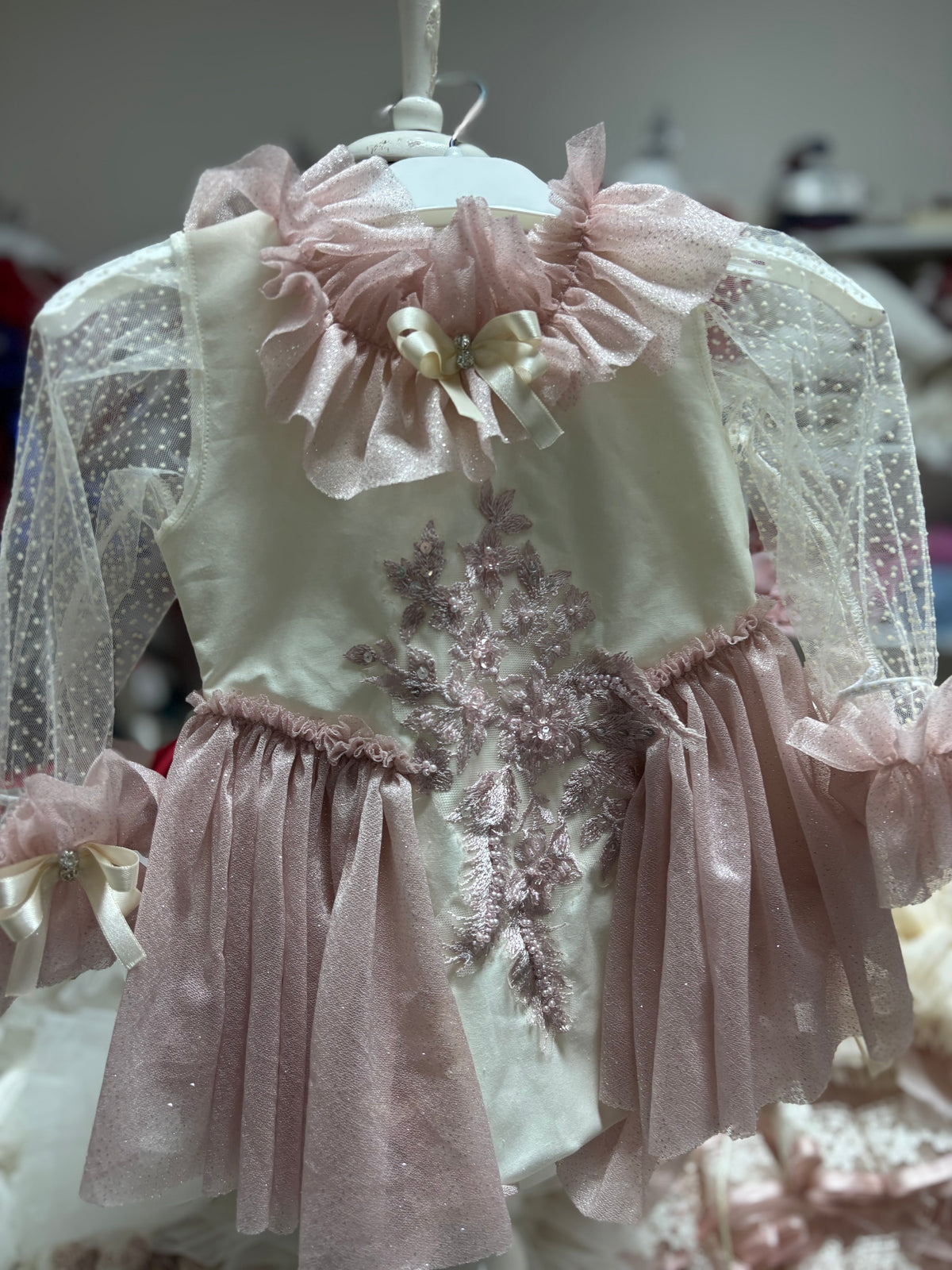 Girl and baby romper