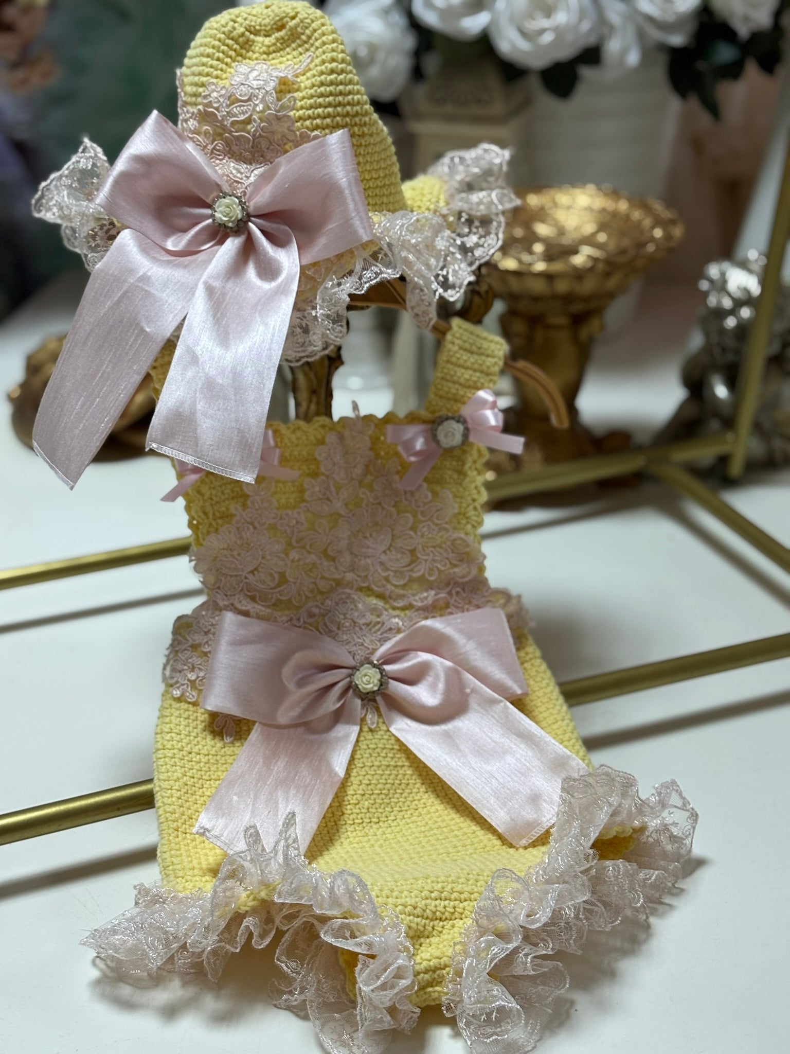 yellow knitwear romper and bonnet lace aplique