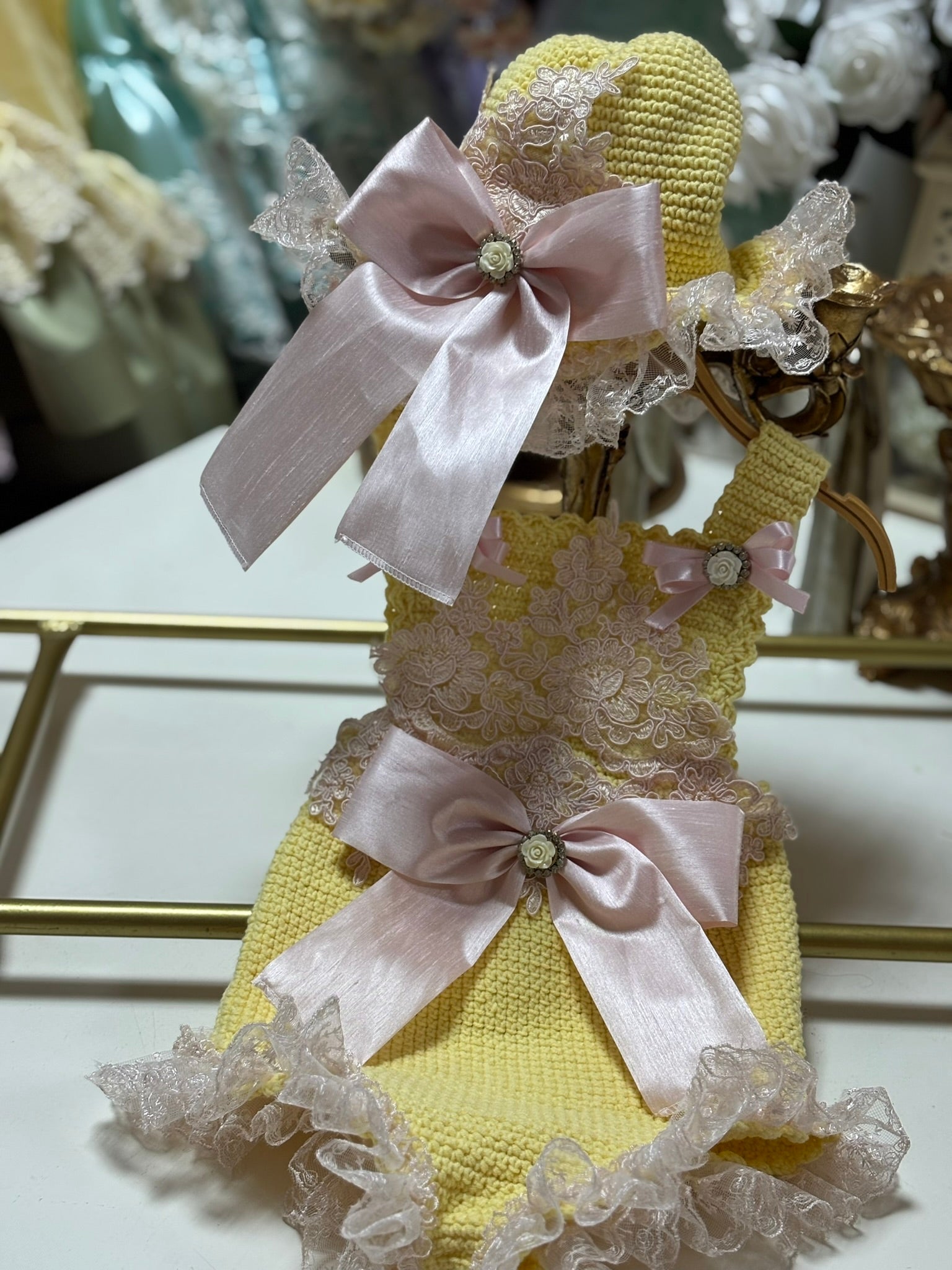 yellow knitwear romper and bonnet lace aplique