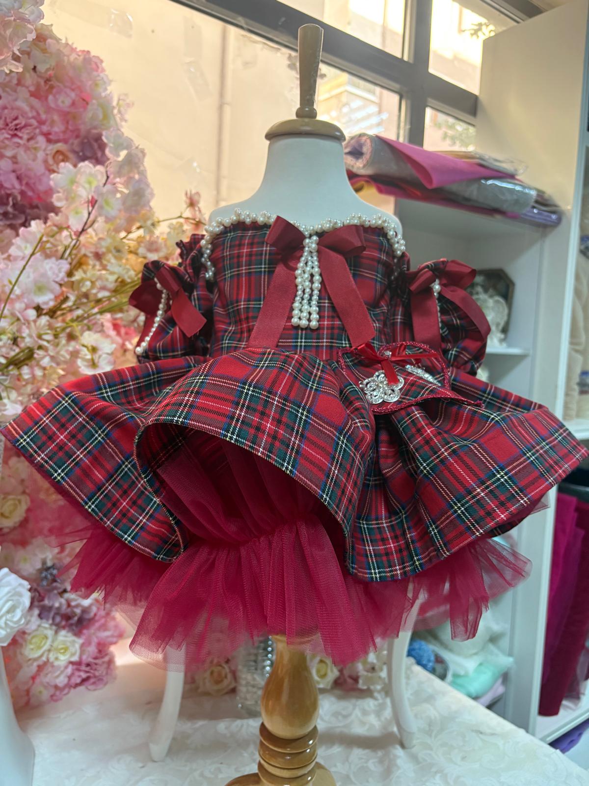 red plain puffy dress and hair bow