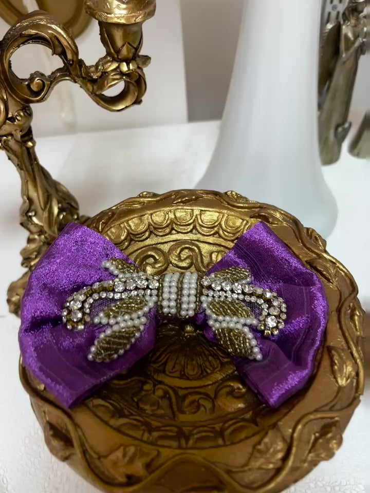 purple rhinestone bow